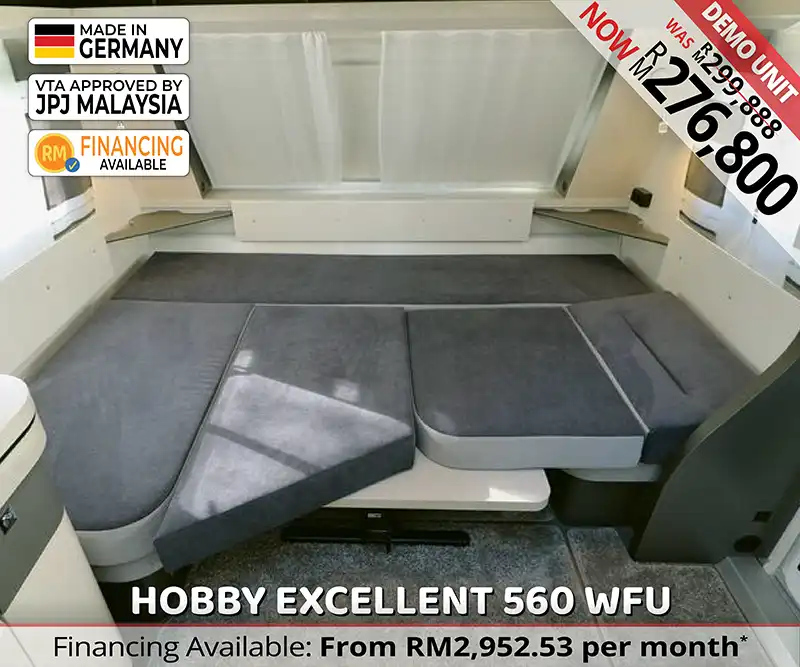 Convertible dining and sleeping area in Hobby Excellent 560 WFU luxury caravan for Malaysian travel.