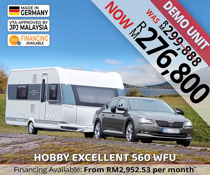 Hobby Excellent 560 WFU caravan being towed through a green meadow, symbolising peaceful outdoor travel and luxury caravanning in Malaysia.