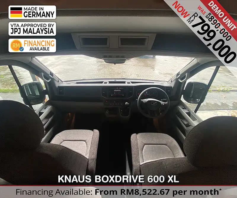 Driver’s cabin of Knaus Boxdrive 600 XL with ergonomic layout and modern dashboard for long-distance Malaysian travel.