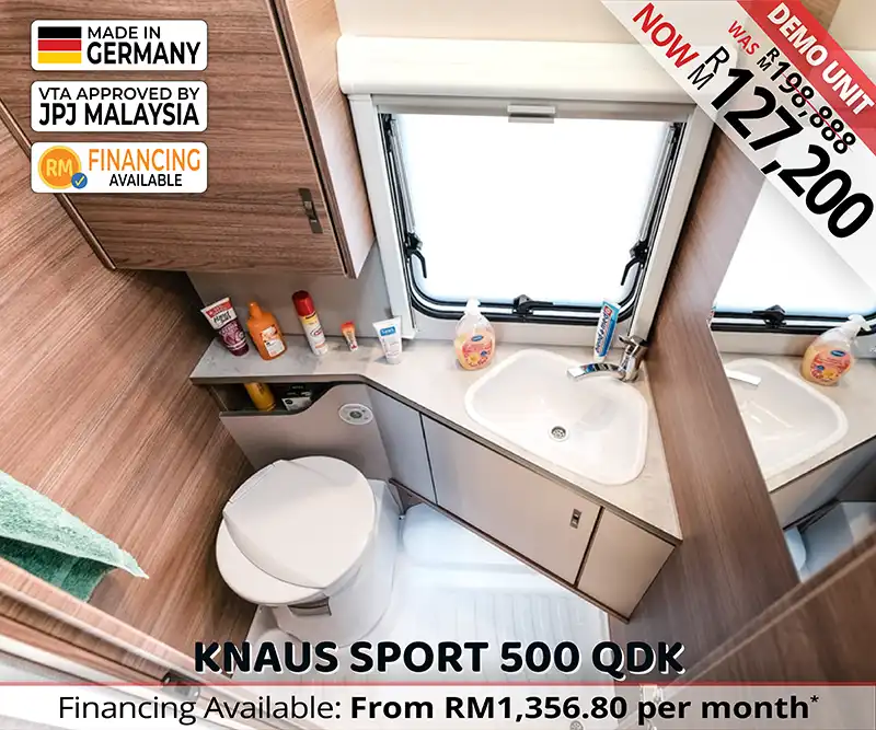 Bathroom in Knaus Sport 500 QDK caravan with toilet, washbasin, and compact shower for Malaysian travellers.