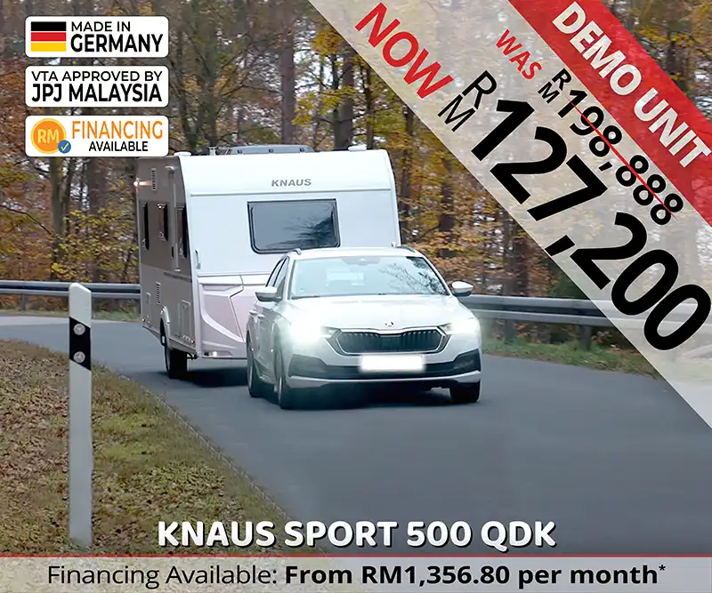 Knaus Sport 500 QDK caravan being towed along the road, symbolising peaceful outdoor travel and luxury caravanning in Malaysia.