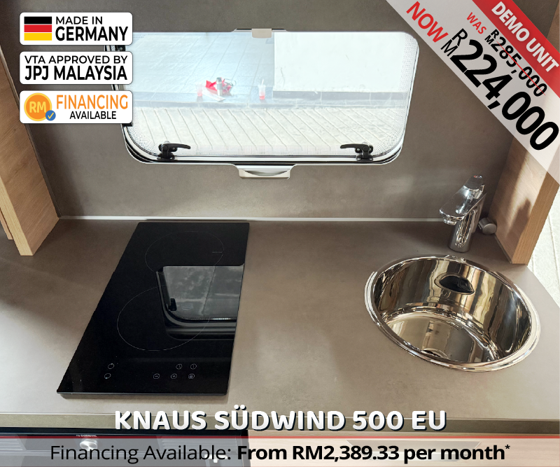Knaus Südwind 500 EU caravan sink and stove area designed for efficient cooking and easy cleaning during Malaysian road trips.