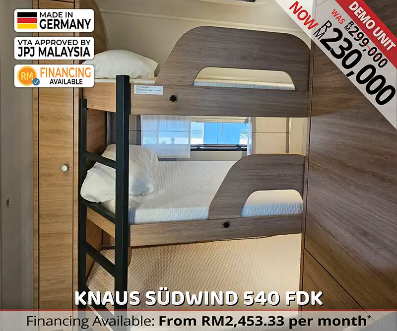 Three-bunk sleeping area in Knaus Südwind 540 FDK caravan designed for families travelling across Malaysia.